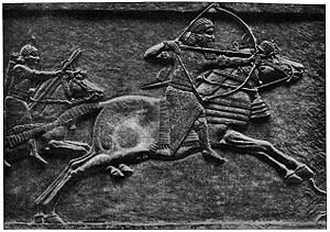 Assurbanipal op ’n jagtog, ’n reliëf uit Nineve.